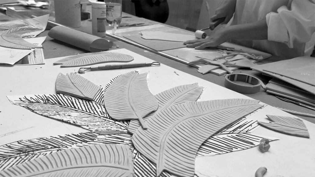 gray pieces of ceramic leaves in production