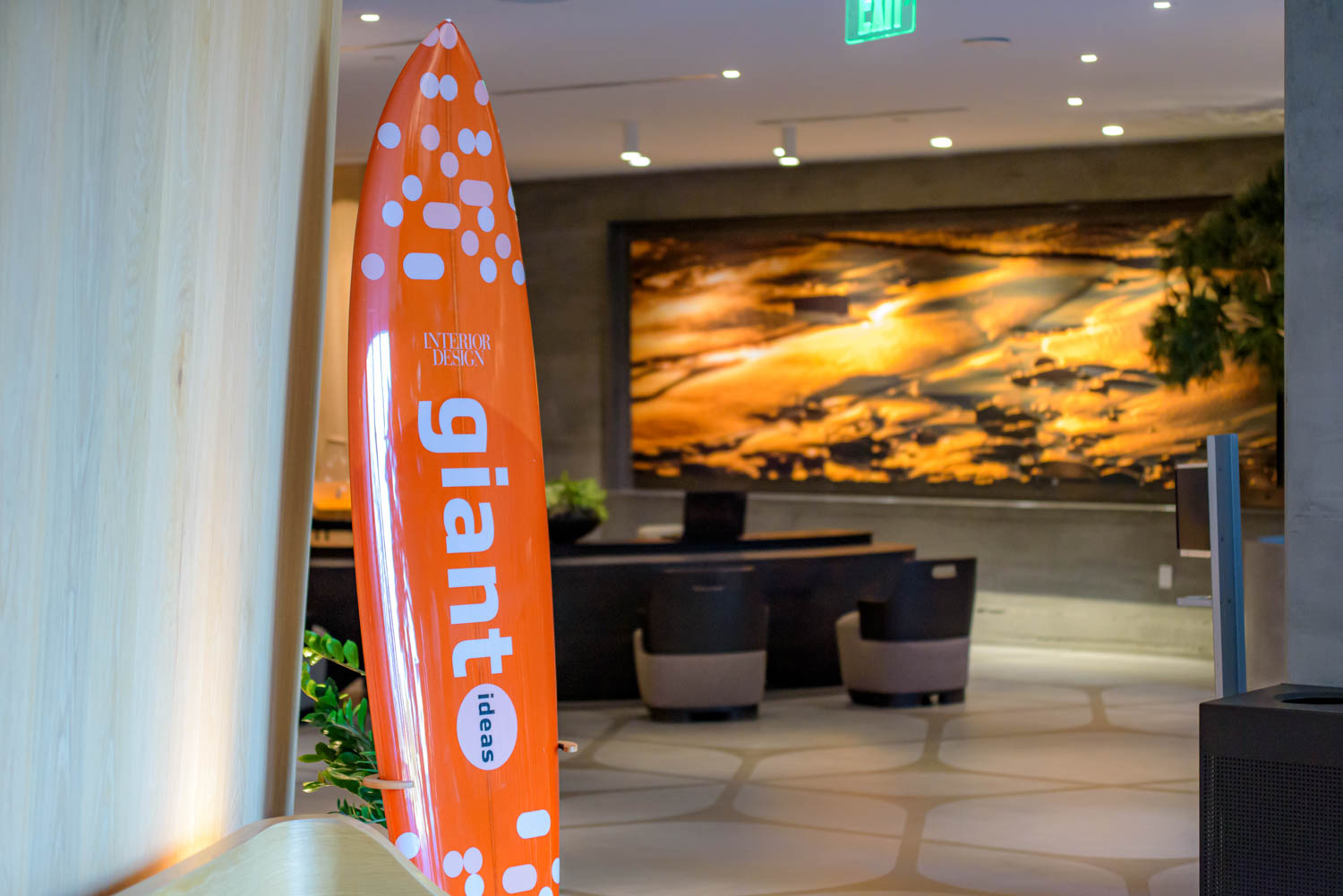 a surfboard with Giants and Rising Talent branding