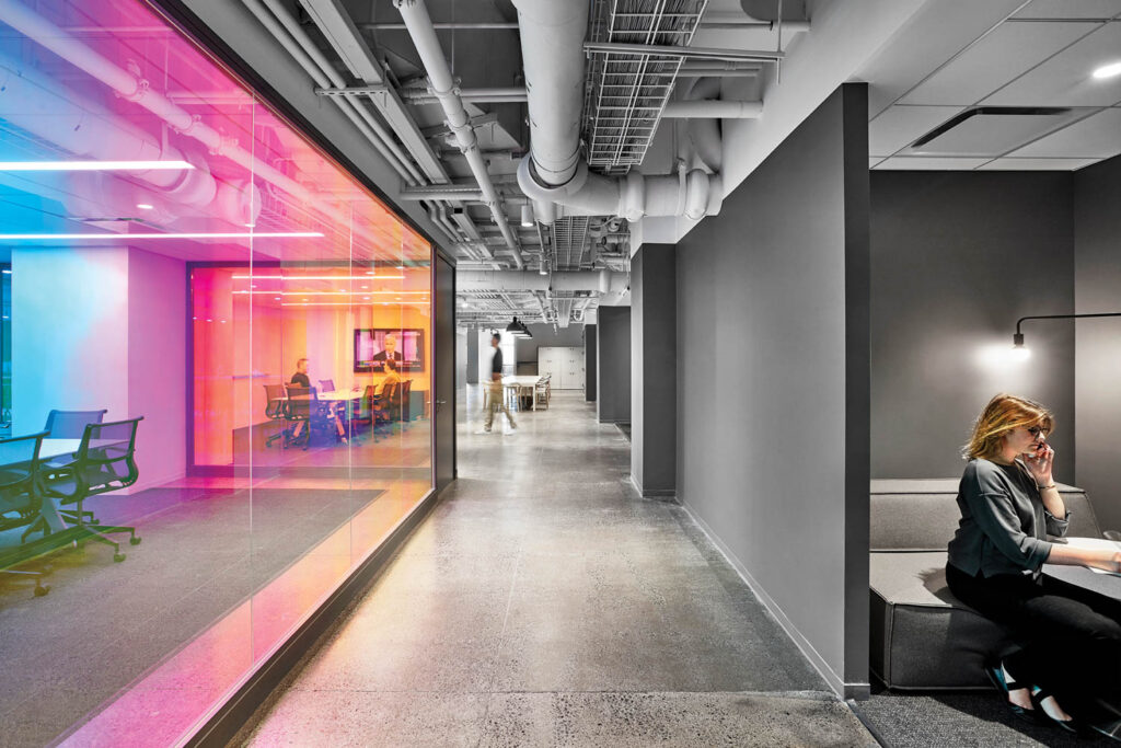 Dichroic glass adding color to the monochrome palette at Verizon’s in-house agency