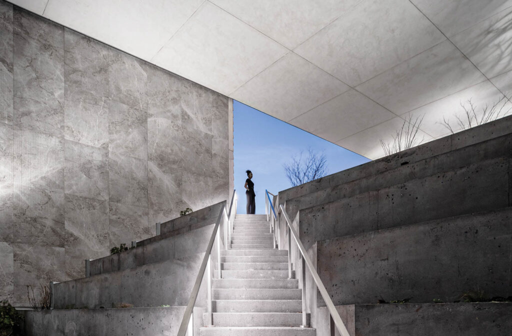 stairs lead to an outdoor amenity area 