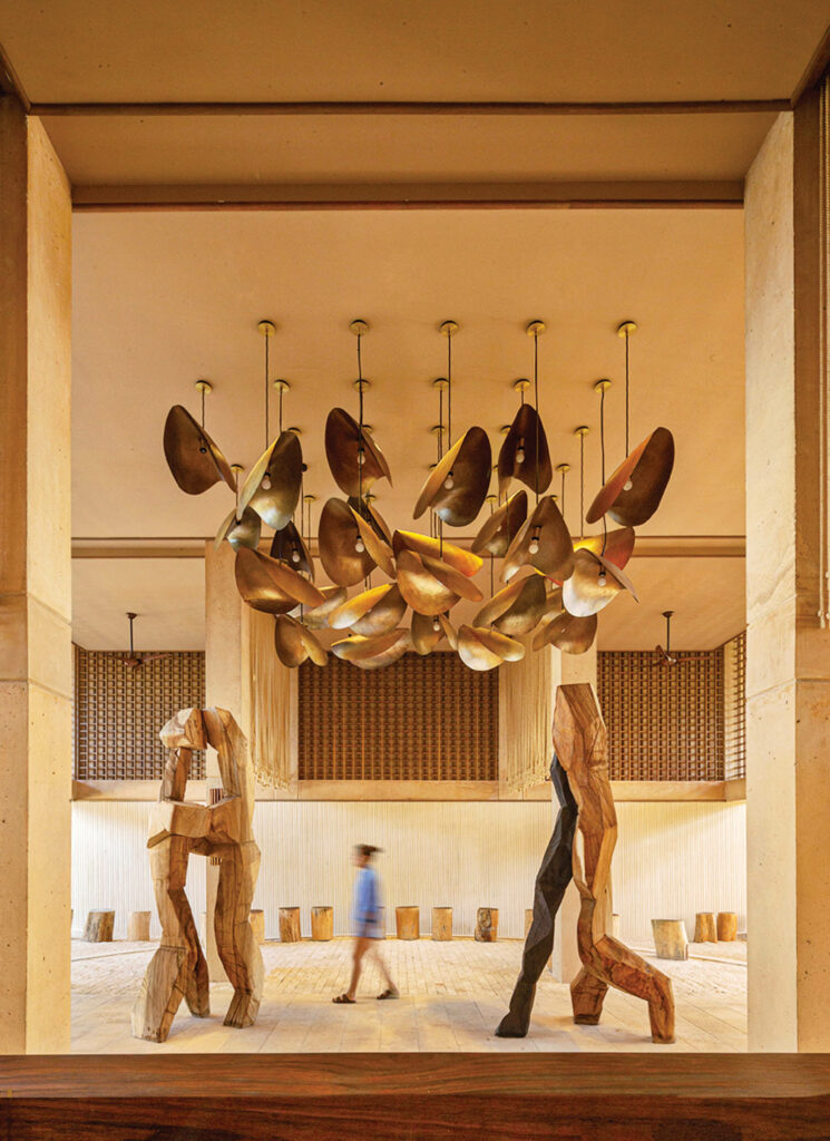 interior lobby of residential complex with elaborate chandelier