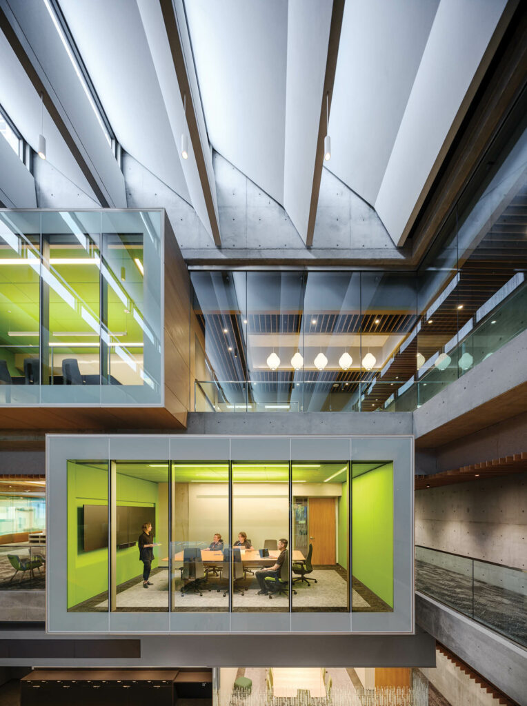 view of different conference rooms through glass windows